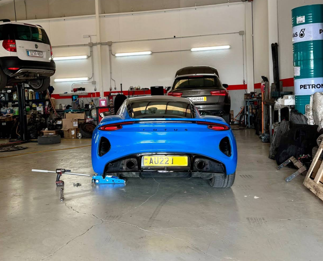 Lotus Emira in the workshop for alignment