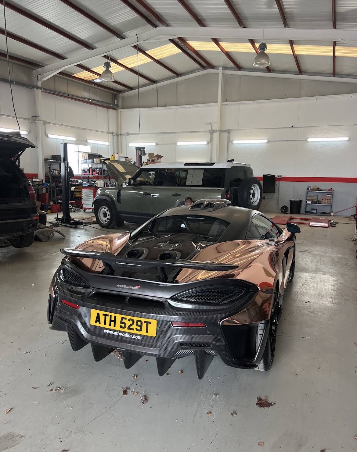 McLaren supercar inside the workshop